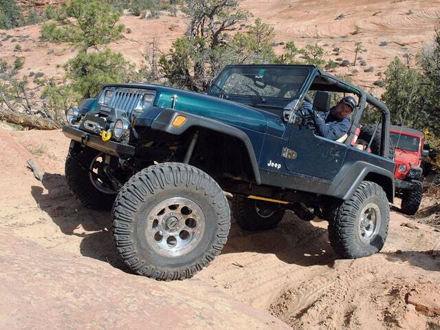 0807_4wd_01_z 1994_jeep_wrangler_yj left_side_view.jpg