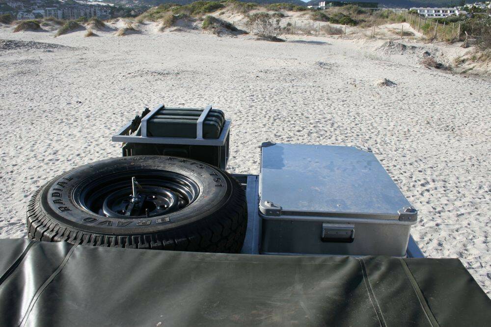 Land-Rover-Defender-110-roof-view-with-roof-tent-spare-tyre-ammo-box-jerry-cans-2.jpg
