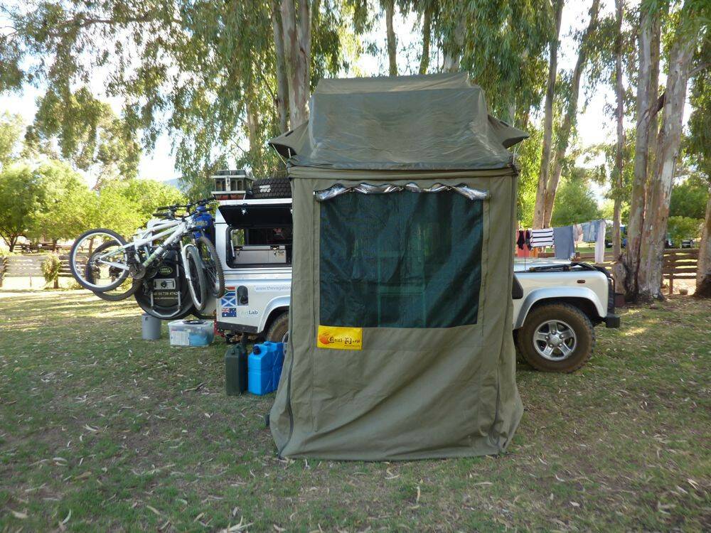 Land-Rover-Defender-110-with-roof-tent-and-additional-room.jpg