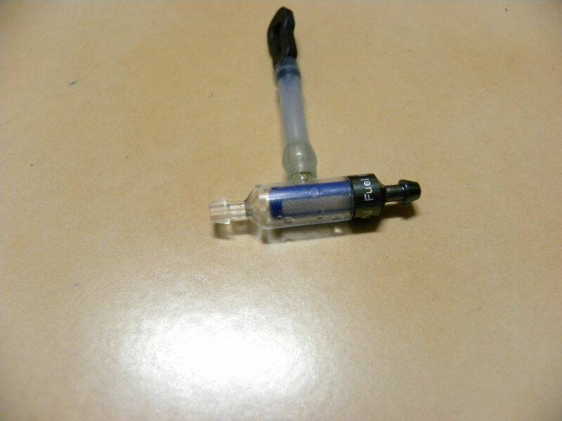 Y牌濾油器(此支為良品)，透明端部易斷裂